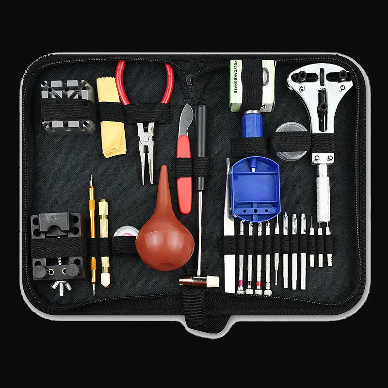 Kit profesional de reparación de relojes con una amplia gama de herramientas como se muestra