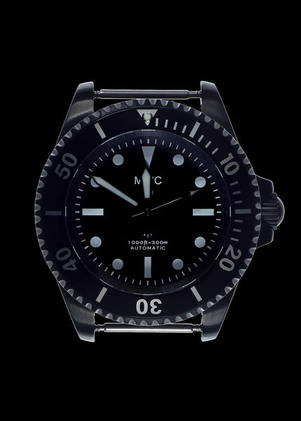 MWC 24 Jewel 1982 Pattern 300m Automatic Military Divers Watch in Black PVD with a Sapphire Crystal on a NATO Webbing Strap (Non Date Version)